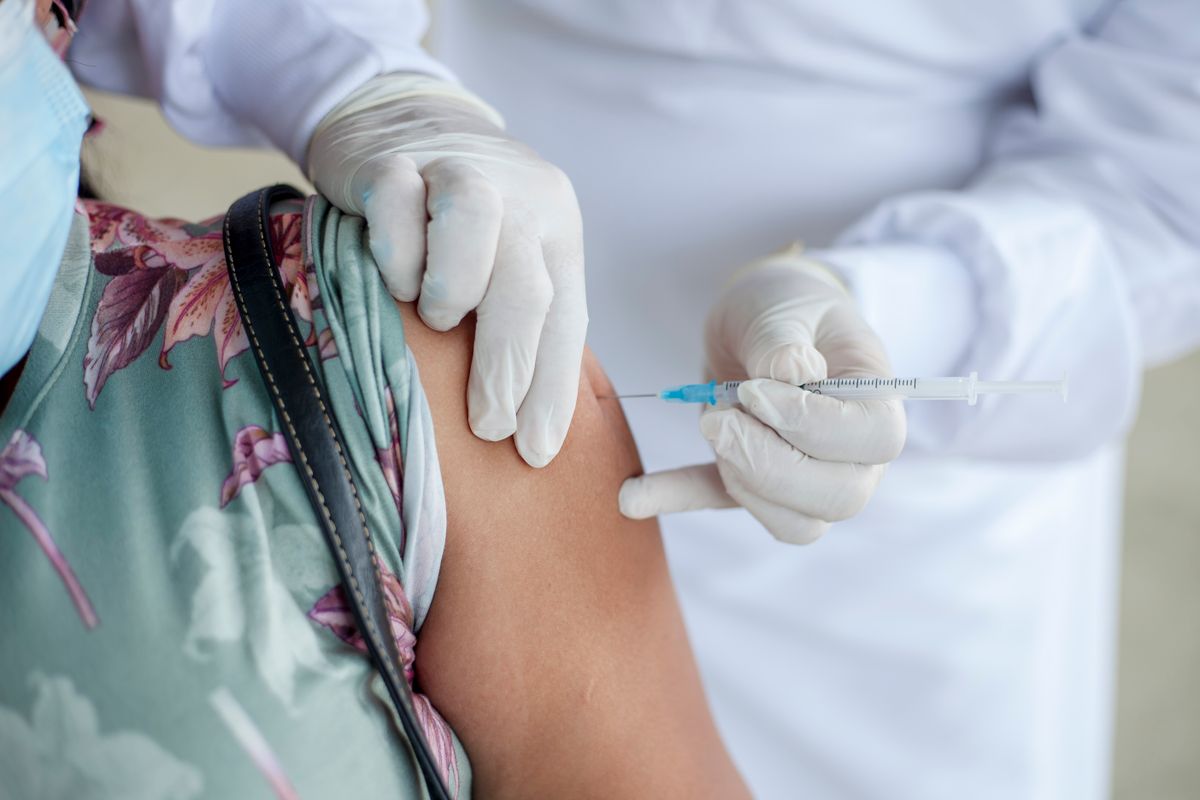 Vaccine being administered in a clinic